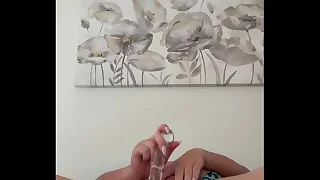 Fucking myself with a glass dildo in the matter of my Asian pussy